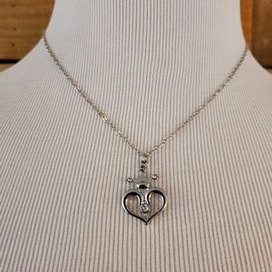 Silvertone open heart necklace with crown & rhinestones